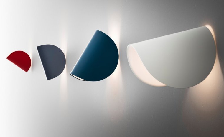 The various finishes of FontanaArte's Io wall light, designed by Claesson Koivisto Rune.