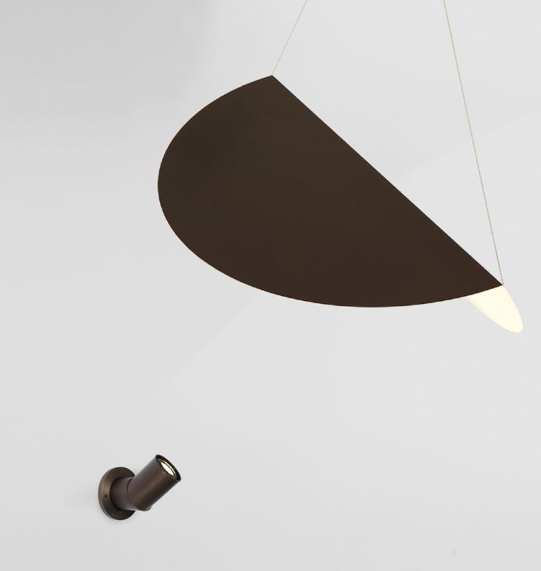 A close-up of Roll & Hill's Bounce Large Shade Wall Mount light, designed by Karl Zahn