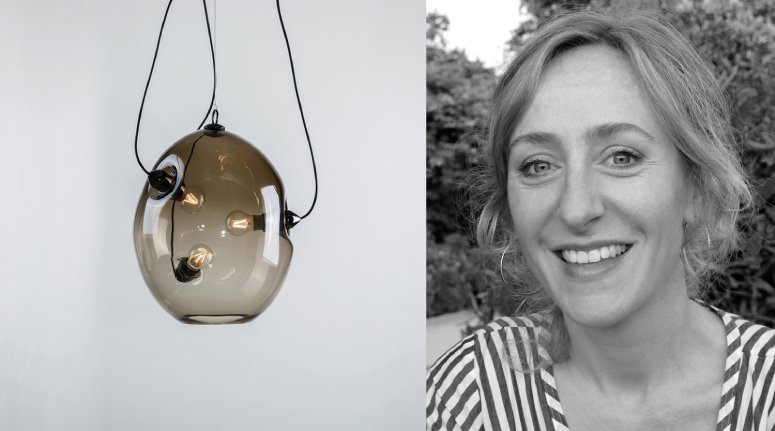 Jette Scheib smiles next to her Membrane pendant light for Innermost.