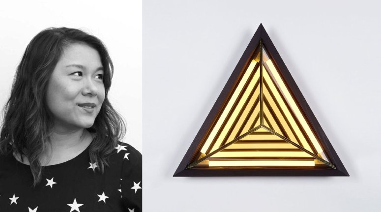 Rosie Li and her Stella Triangle wall light for Roll & Hill.