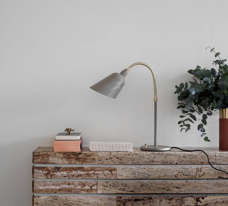 &tradition's Bellevue desk lamp sits on chic credenza.