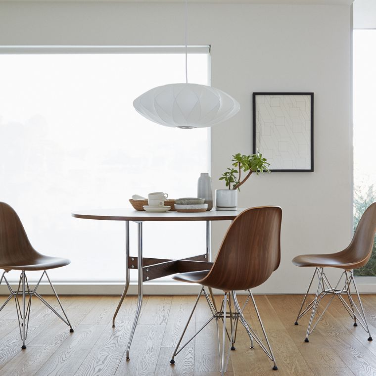 A quietly minimalist kitchen nook with Nelson Crisscross Bubble Saucer Pendant, of George Nelson's iconic Nelson© Bubble Lamp series from Herman Miller