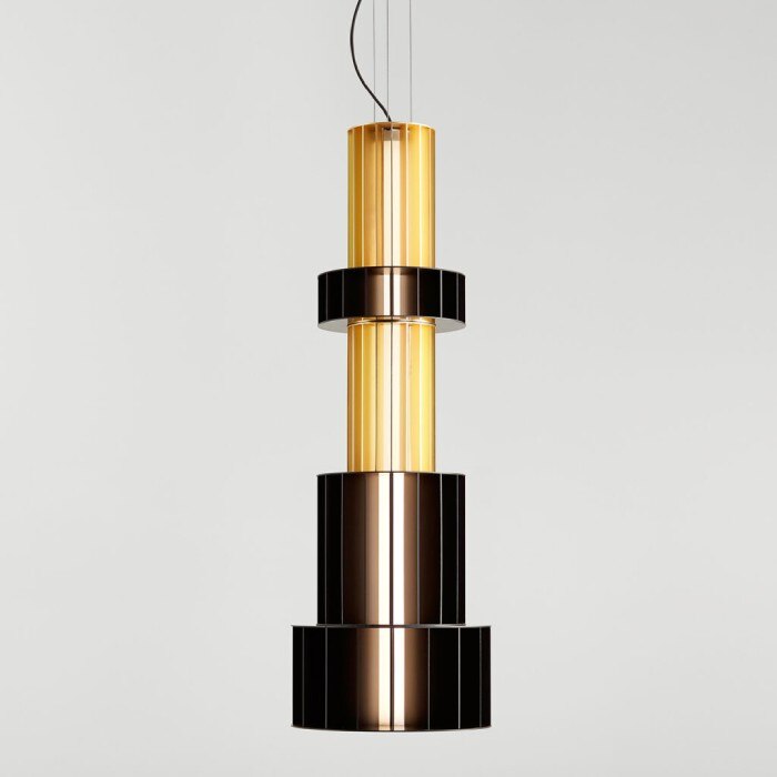 A studio photo of Parachilna's Babel T GR suspension light, designed by Stephen Burks.