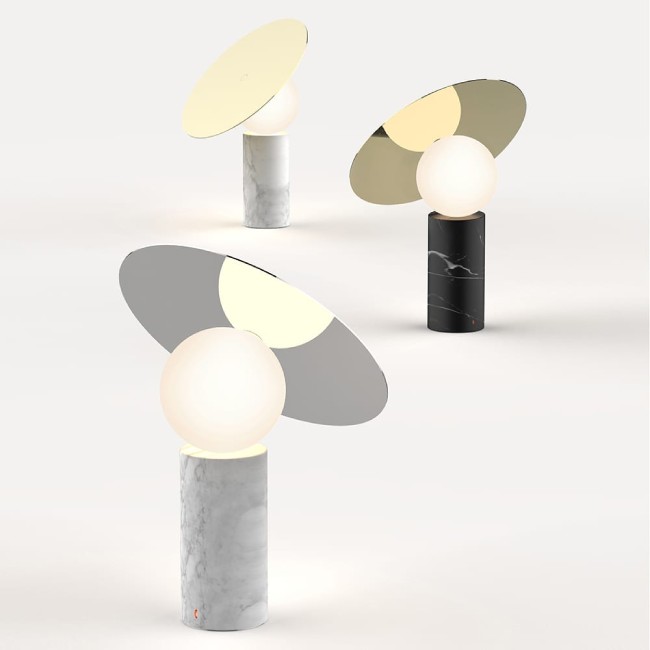 A trio of Bola Disc table lights from Pablo in several finishes.