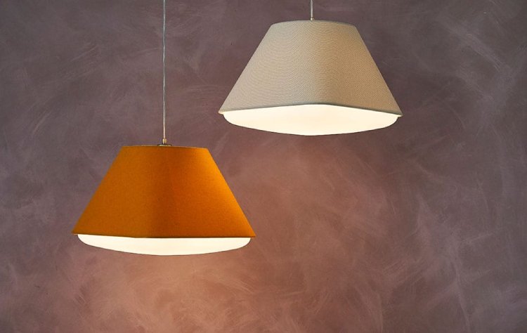 Two bespoke Innermost acoustic pendant shades in the perhaps-inideally-named RD25Q shape. One in WenLock Orange and the other in Baumann Orchid.