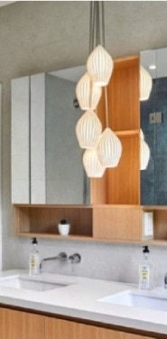 Fin Grouping of 5 cluster suspension light in a warm bathroom