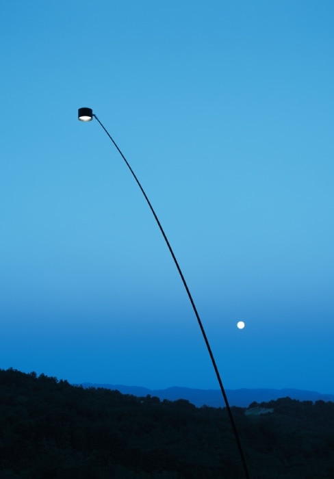 Sampei Outdoor floor stretches into the sky with the moon in the background.