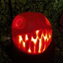 A jack-o'-lantern carved roughly into the shape of a Chain Chomp of Mario Bros fame.