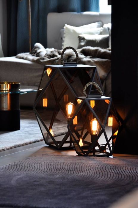 Contardi's Muse Lantern table lights in a lush living room.