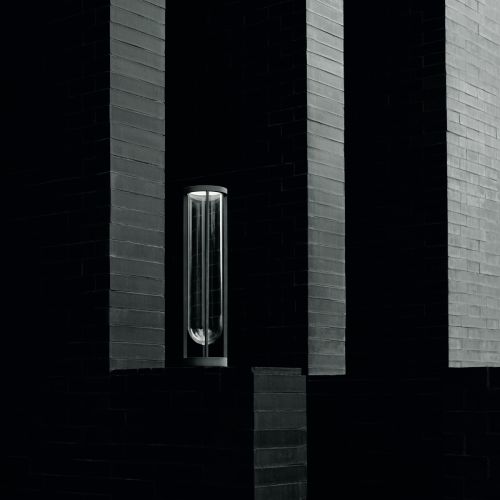 An almost expressionist shot of In Vitro Unplugged outdoor portable table light, designed by Philippe Starck for Flos.