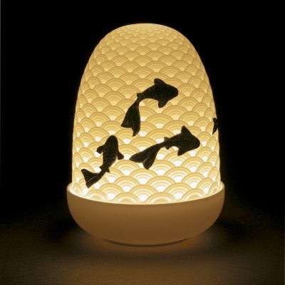 Koi Dome portable table light from Lladró, illuminated.