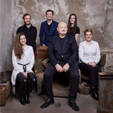 Jan Rabell poses with his wife and children.