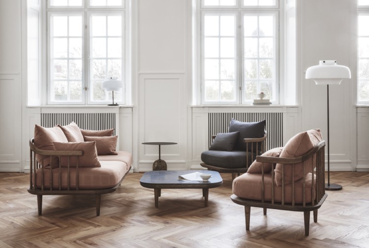 A collection of &tradition furniture and designer lighting, including Copenhagen table light and Copenhagen floor light, in a Scandinavian-inspired living room.