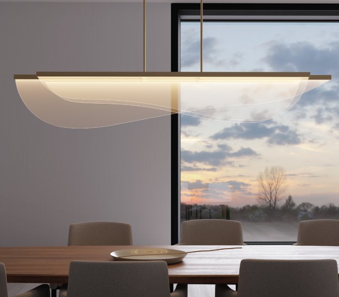 Tech Lighting's Nyra 60 linear suspension light illuminates a warmly-decorated office boardroom.