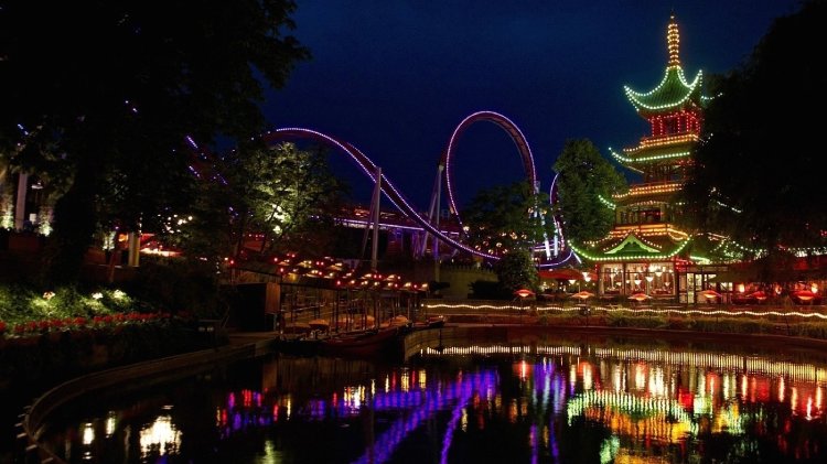A view of the carnivalesque lights of Tivoli Gardens, as it appears today, by night. 