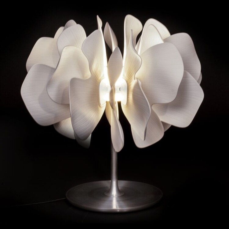 The supple porcelain perfection of Lladro's Nightbloom table lamp.