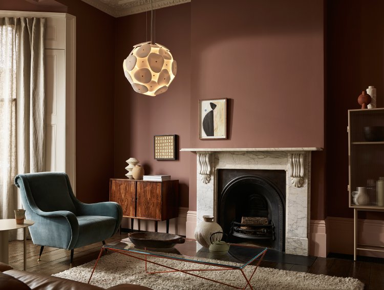 A richly-appointed living room featuring Pebble pendant light from Original BTC