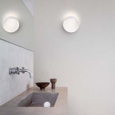 Flindt outdoor wall and ceiling sconce in a bauhaus inspired bathroom