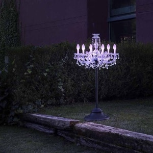 Drylight TL6 outdoor table lamp glows with a delightfully spooky violet light in this outdoor lighting plan.