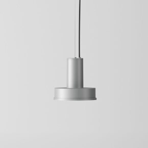 Arne S Domus suspension light from Santa & Cole enjoys a close-up studio shot.