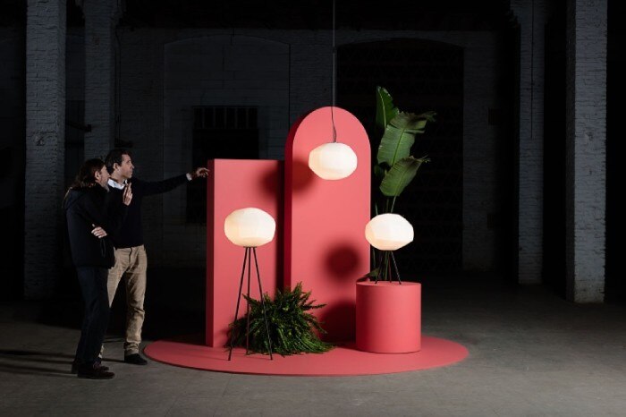 Roman Riera and Alfredo Valero discuss a display of Gemo collection lights, designed by Luca Nichetto, during a photo shoot for the Parachilna catalogue.