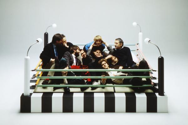 The original Memphis group poses together in a pile in the middle of the wrestling-ring-inspired Tawaraya Ring