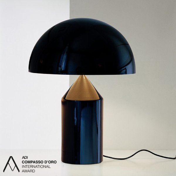 Oluce's iconic Atollo 233 table lamp, designed in 1978 by Vico Magistretti, in the black finish option.