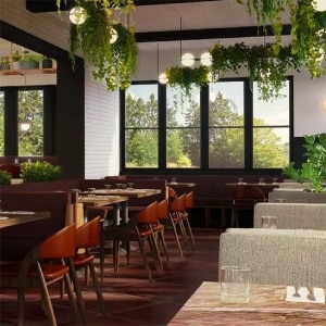 Interior dining area of an Earls Restaurant featuring biophilic design elements and lights supplied by LightForm.