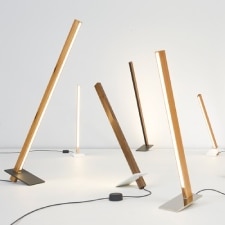 The Torch family of floor and table lights from Stickbulb in a variety of sustainably-sourced and reclaimed materials.