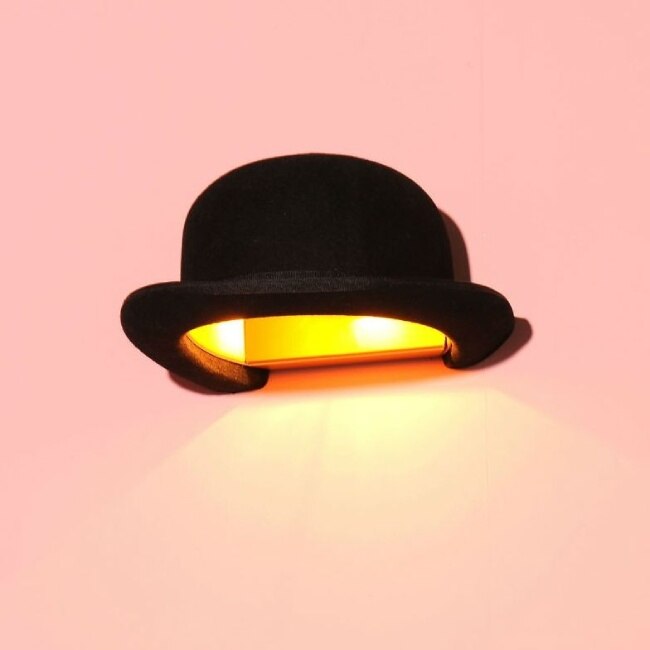 The bowler-shaped Jeeves wall light, designed by Jake Phipps for Innermost