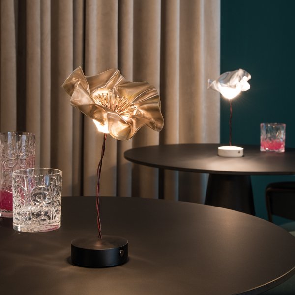 Slamp's LaFleur portable table lamp by Marc Sadler on a pair of cabaret tables. LaFleur Velvet is foregrounded with an original LaFleur behind.