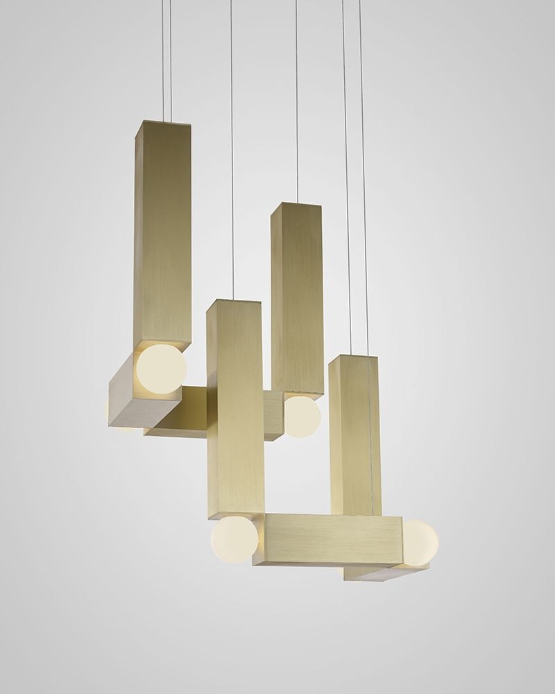 Lee Broom’s new Vesper, a modular chandelier, comes in gold or silver.