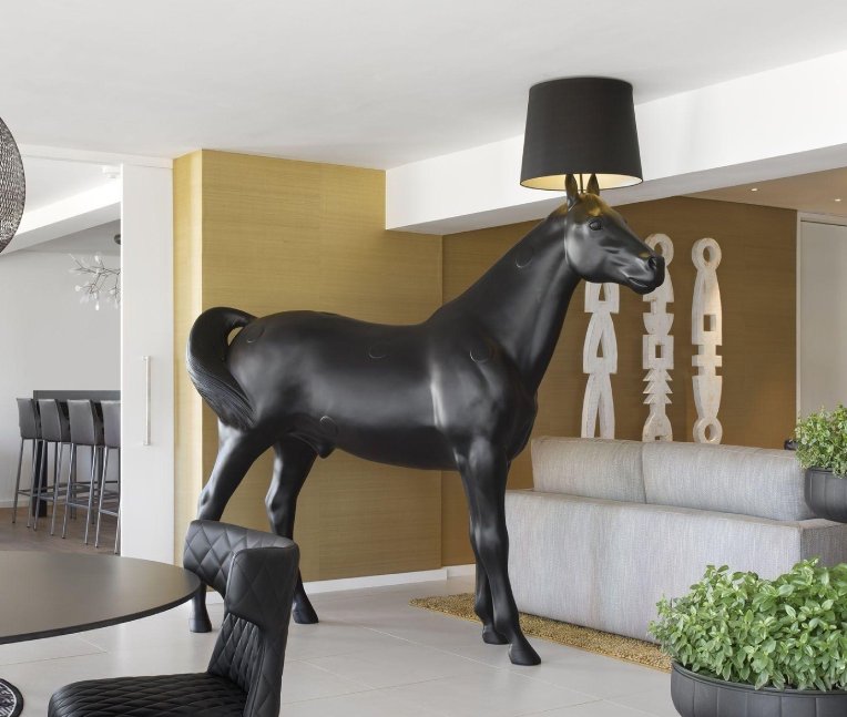 Front Design's Horse floor structure for Moooi stands proudly in a sleek contemporary apartment.