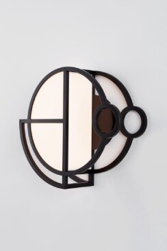 A studio shot of Moonrise wall sconce 1 in black.