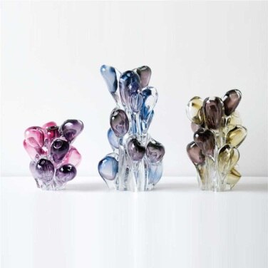 A studio image of the three sizes of Bloom decorative object.