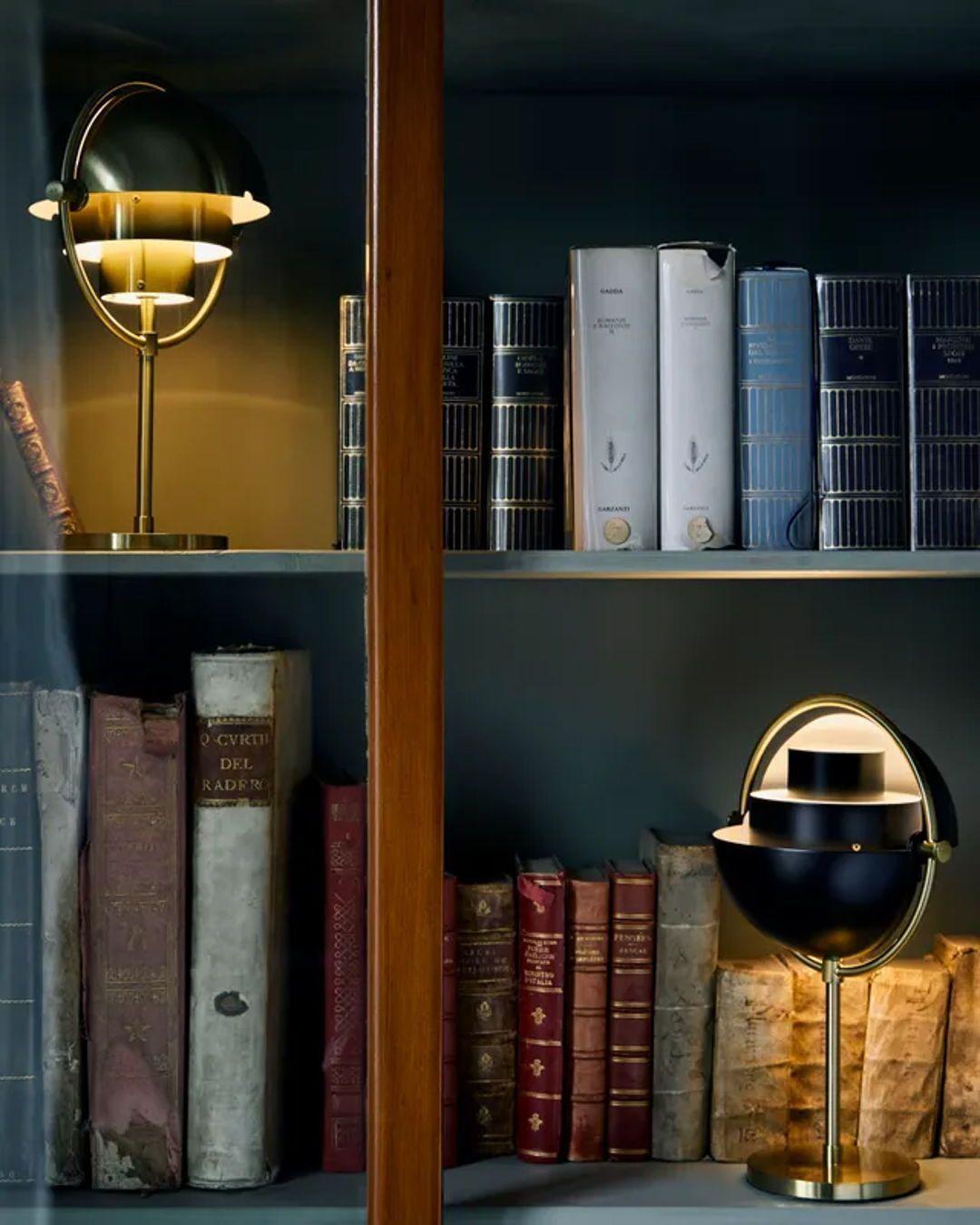 Two Multi-Lite Portables on a bookshelf