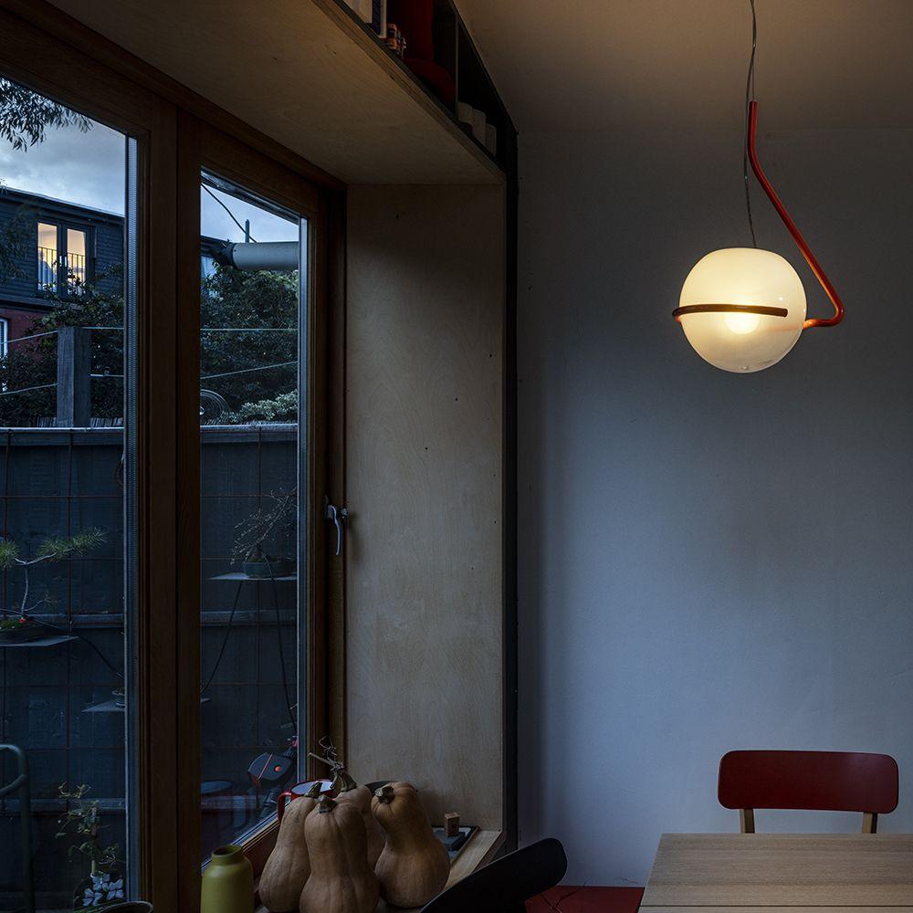 Tonda Suspension hanging above a dining table