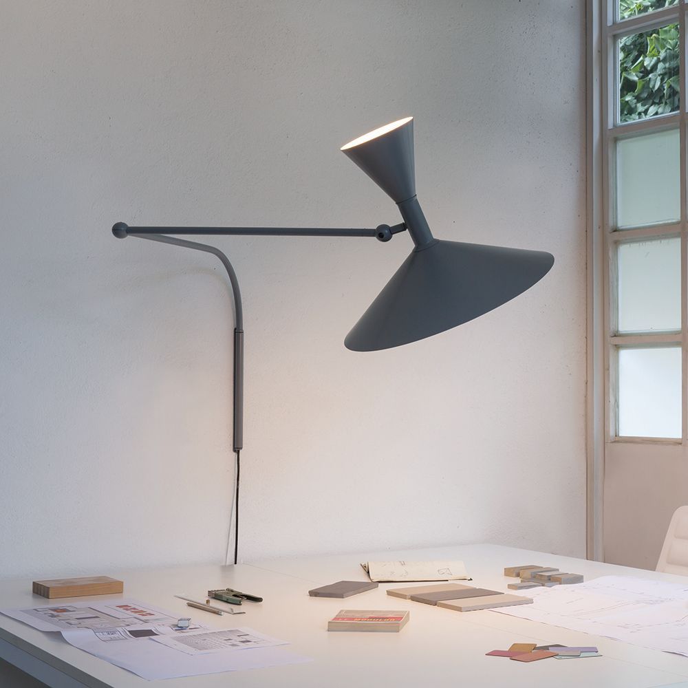 From left: The multiple configurations of the Swing Dome Light Wall from Stuff by Andrew Neyer allows for flexibility and style; the Lampe de Marseille Wall Light from Nemo, designed by Le Corbusier, is perfect for lighting your multifunctional work desk and dining table.