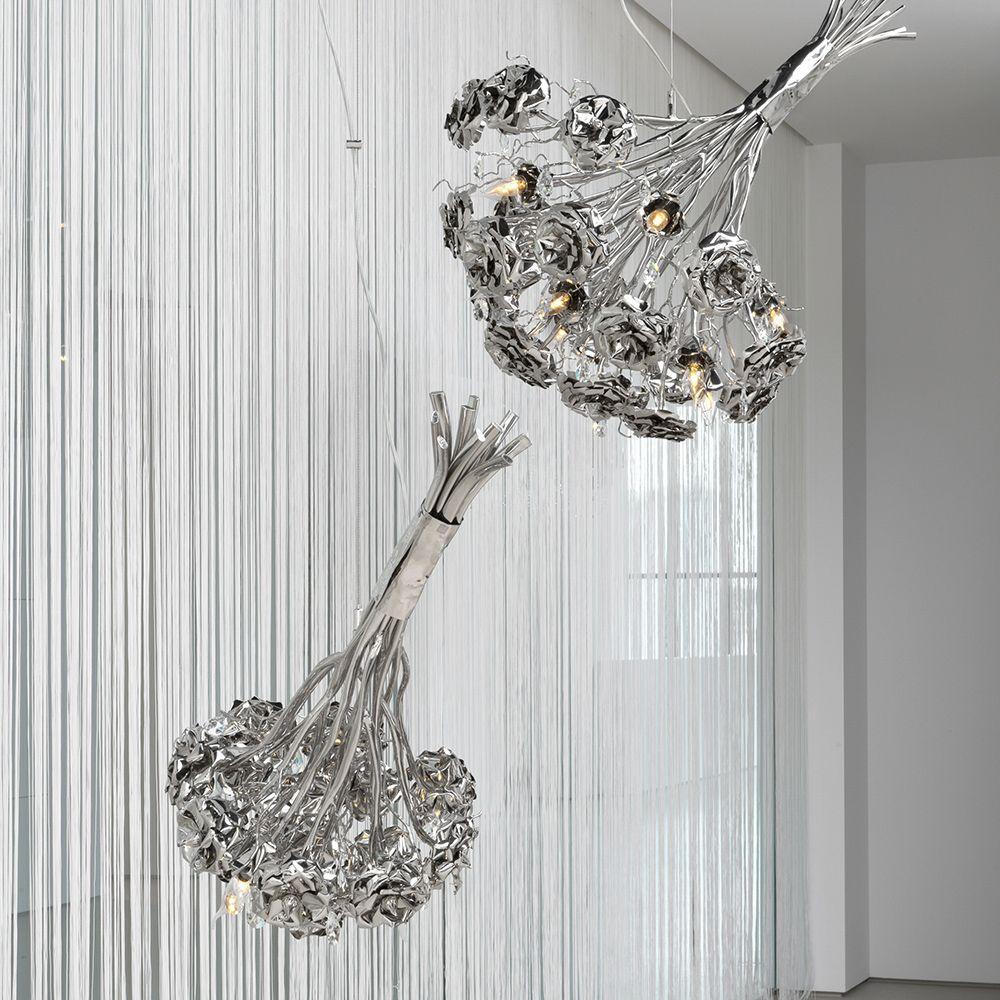 Brand van Egmond's La Vie En Rose Collection features exquisite steel luminaires designed as delicate flower bouquets, offering a stunning array of single or clustered floral designs.