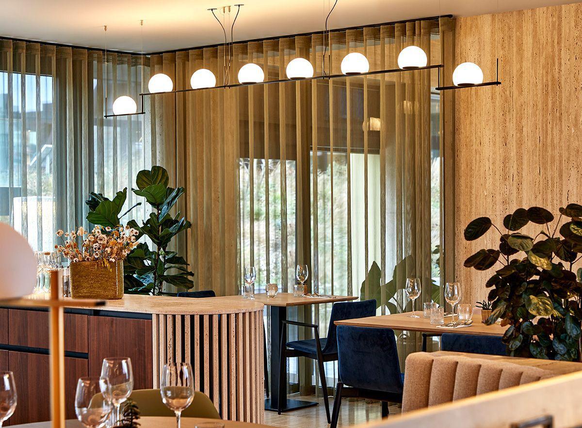 The Circ Chandelier adds warmth and comfort to a meeting room; the Portable and Floor versions make a patio lounge area cozier.