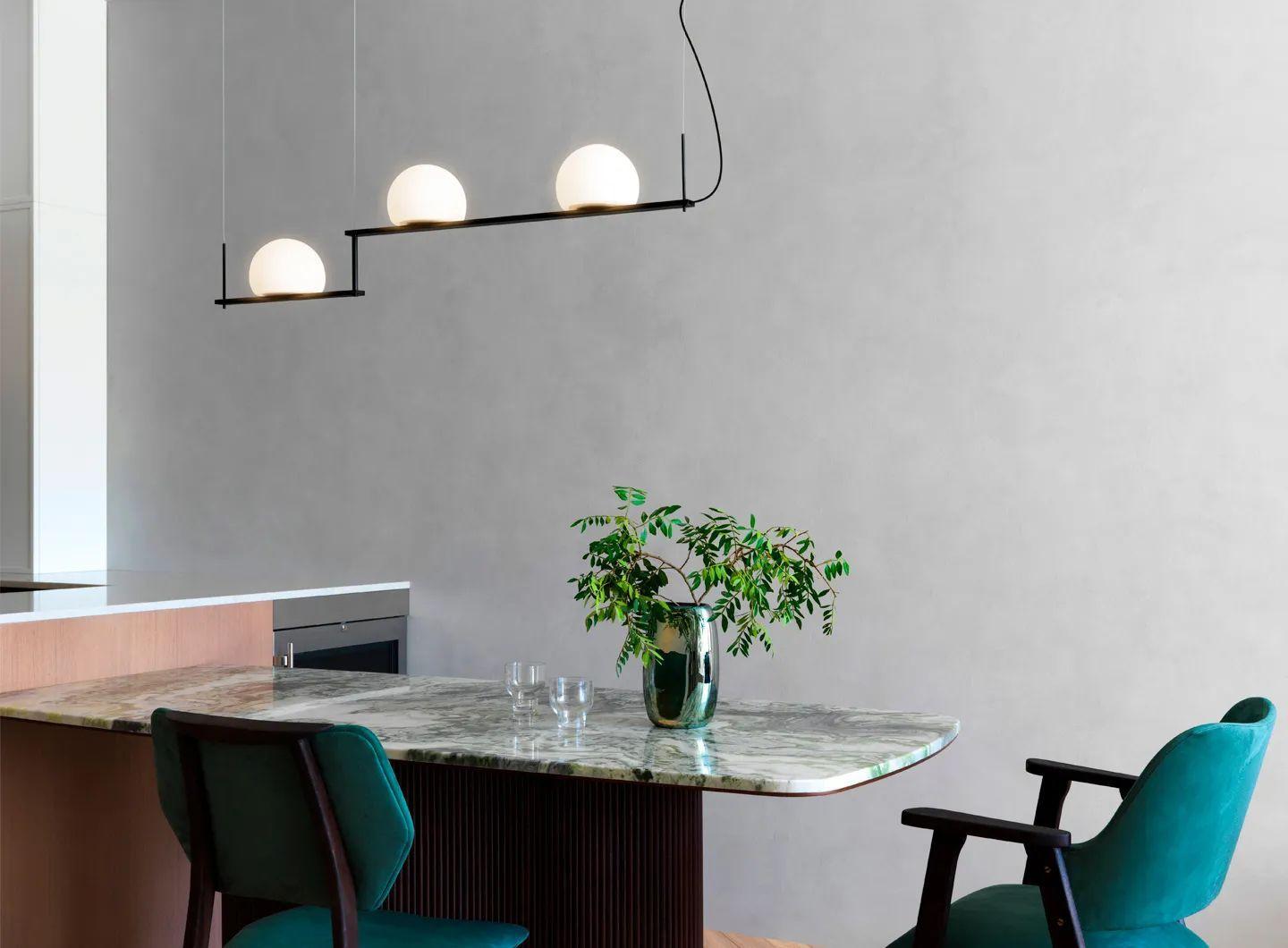 The Circ Chandelier adds warmth and comfort to a meeting room; the Portable and Floor versions make a patio lounge area cozier.