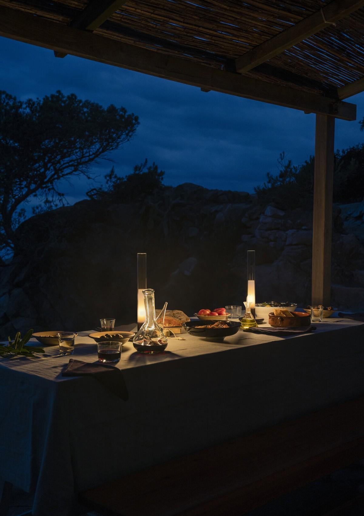 The Sylvestrina Portable Lamps from Santa & Cole lighting evening gatherings al fresco.