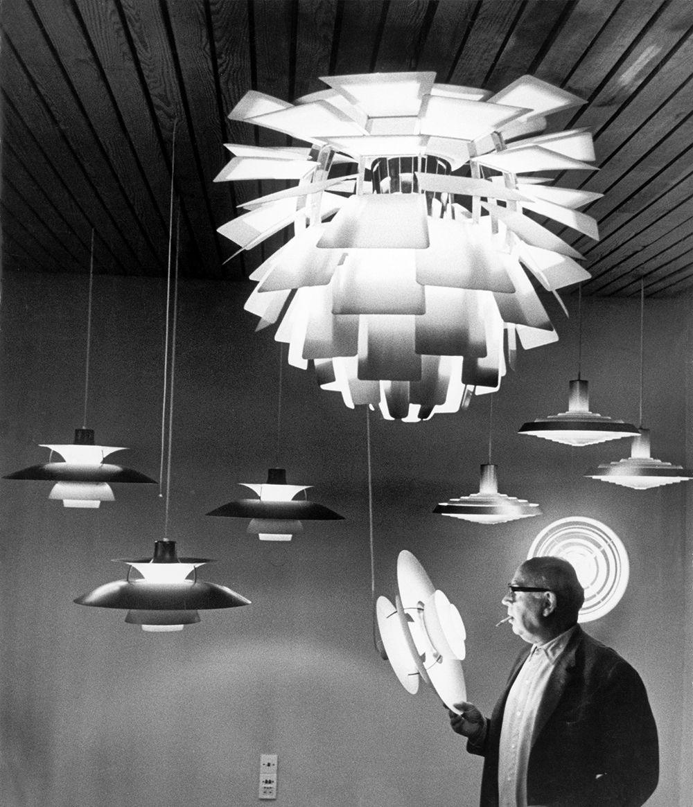 Poul Henningsen with his lighting designs, manufactured by Louis Poulsen