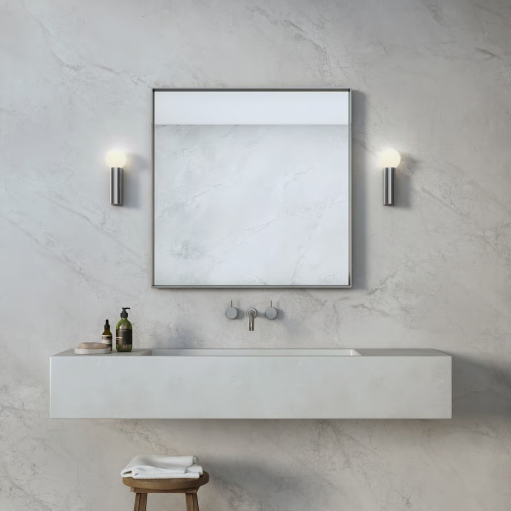 Ortona Wall Lights in polished chrome are damp-rated, perfect for either side of the bathroom mirror.