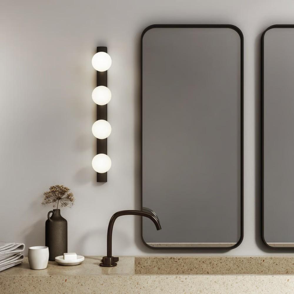 Cabaret Wall Light (left); io Wall Light (right). Both are damp-rated.