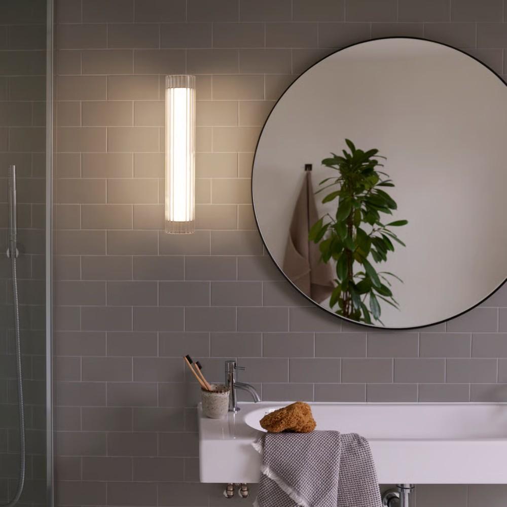 Cabaret Wall Light (left); io Wall Light (right). Both are damp-rated.