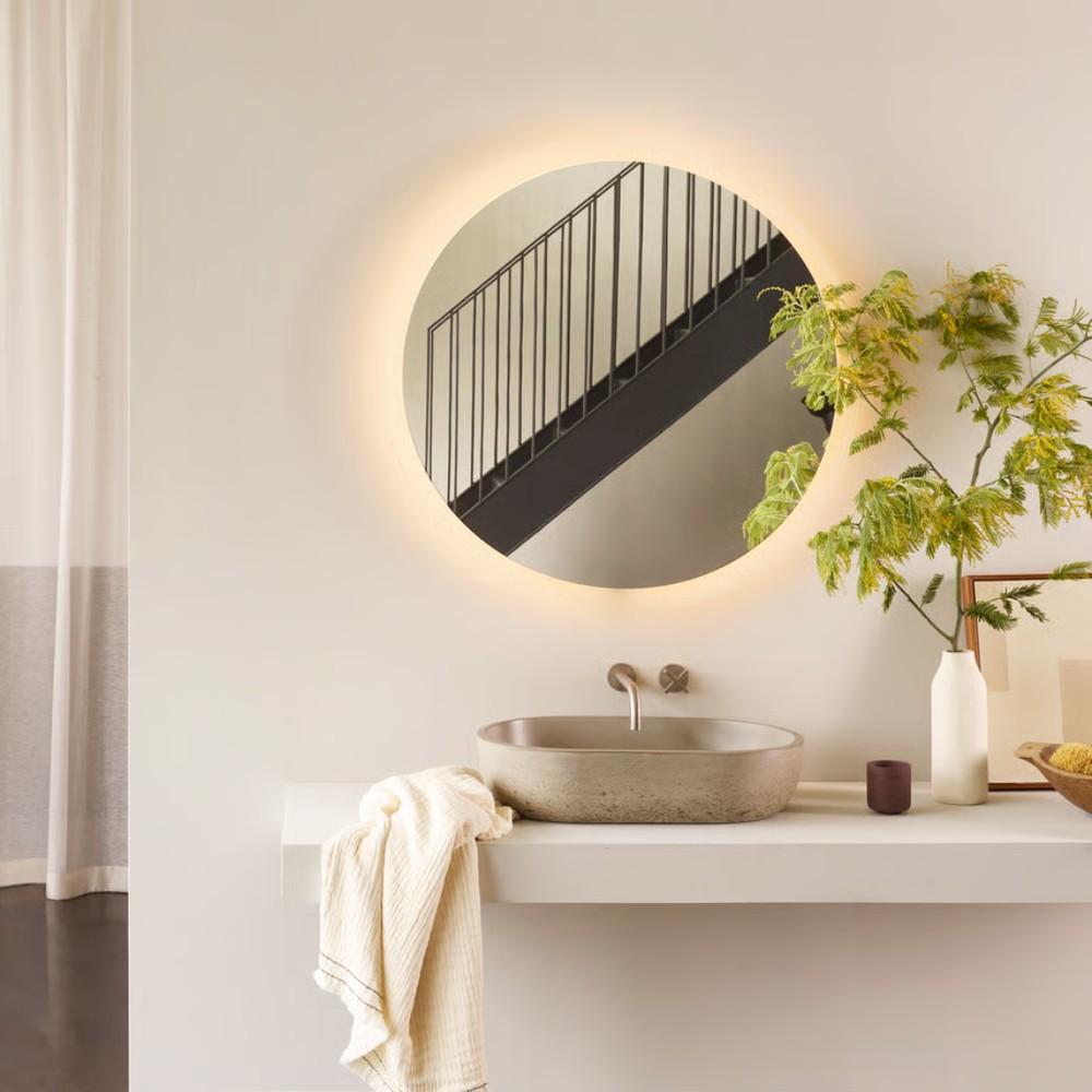 Varenna Round (left); Varenna Rectangle (right). The Varenna Collection is damp-rated, perfect for bathroom vanities.