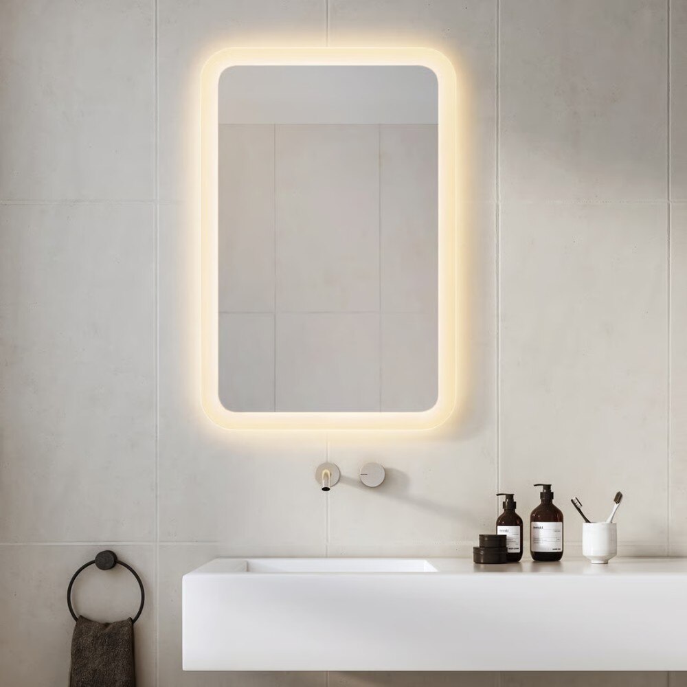 Varenna Round (left); Varenna Rectangle (right). The Varenna Collection is damp-rated, perfect for bathroom vanities.