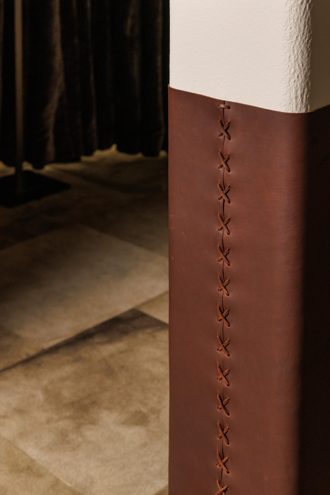 Leather wrapped pillar